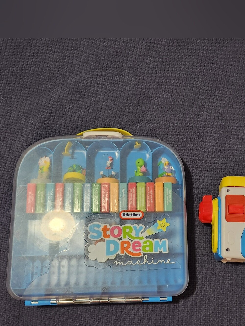 Little Tikes Story Dream Machine w/ Case, 16 Stories, & 6 Characters.